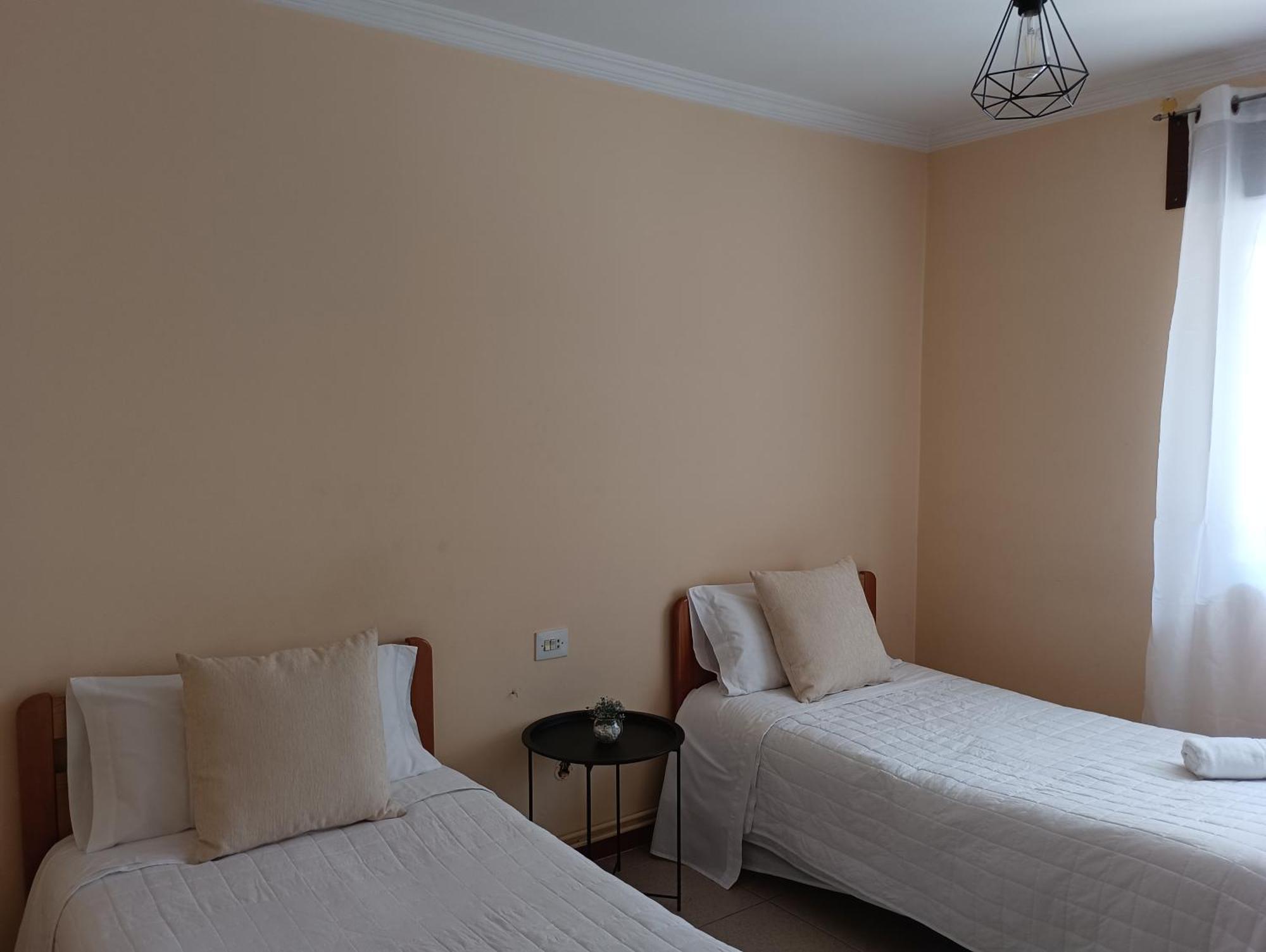 Hostal Pension Mar De Plata لوغو الغرفة الصورة